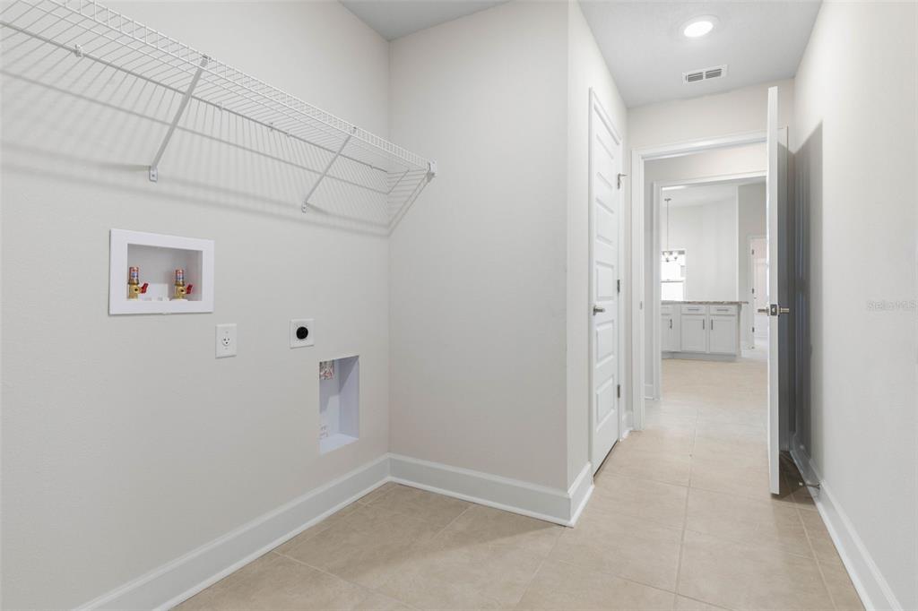 52 Undershire Path Palm Coast, FL 32164 - Photo 35 of 54 an empty room with a bathroom and a sink