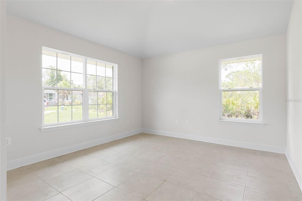 52 Undershire Path Palm Coast, FL 32164 - Photo 7 of 54 an empty room with a window