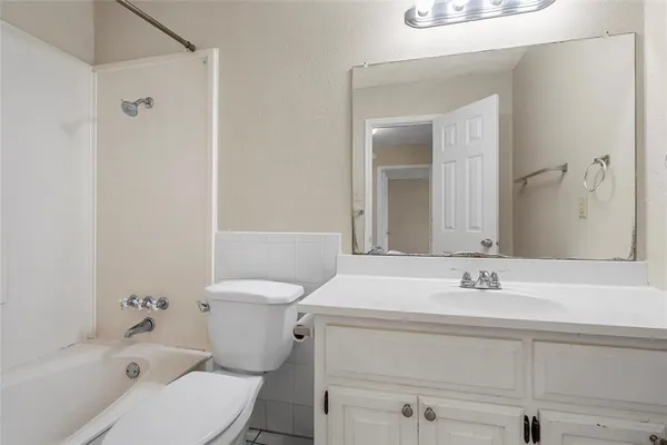 a view of a swimming pool and a yard