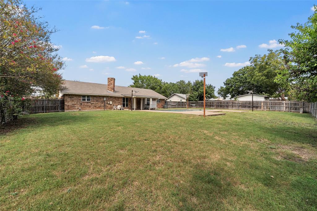 309 Crescent Drive Hewitt, TX 76643 - Photo 13 of 16 a view of a house with a backyard