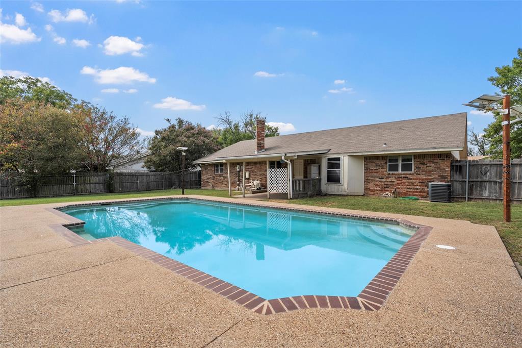 309 Crescent Drive Hewitt, TX 76643 - Photo 2 of 16 a view of a house with swimming pool and a yard