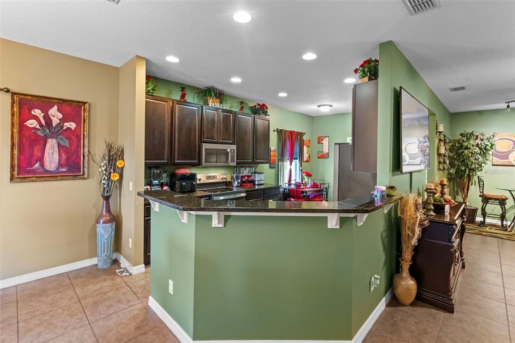 3509 Spring Creek Road Dundee, FL 33838 - Photo 14 of 32 a kitchen with lots of counter top space