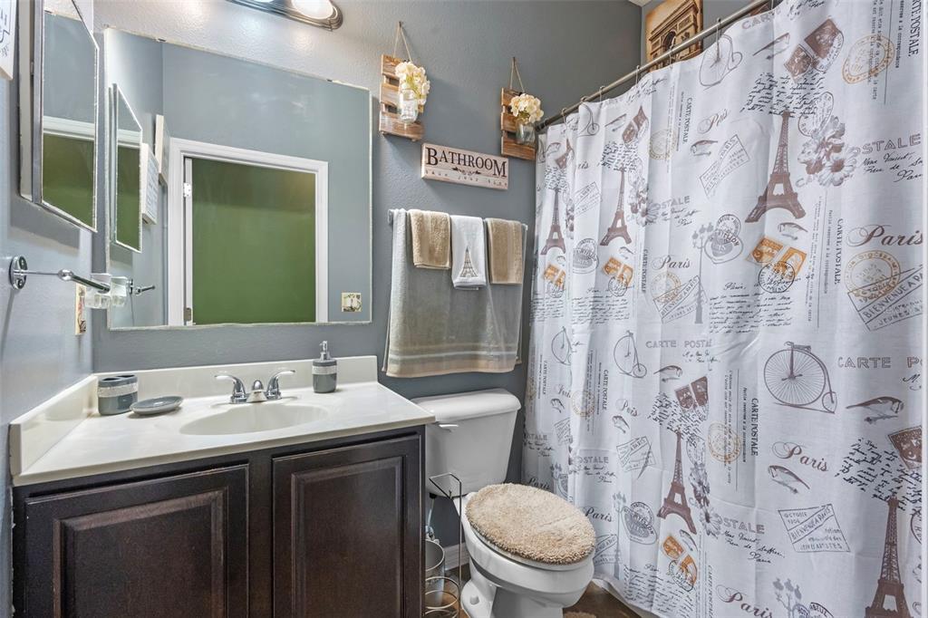 3509 Spring Creek Road Dundee, FL 33838 - Photo 24 of 32 a bathroom with a sink and a mirror