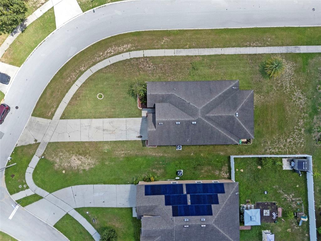 3509 Spring Creek Road Dundee, FL 33838 - Photo 29 of 32 an aerial view of a house with a yard