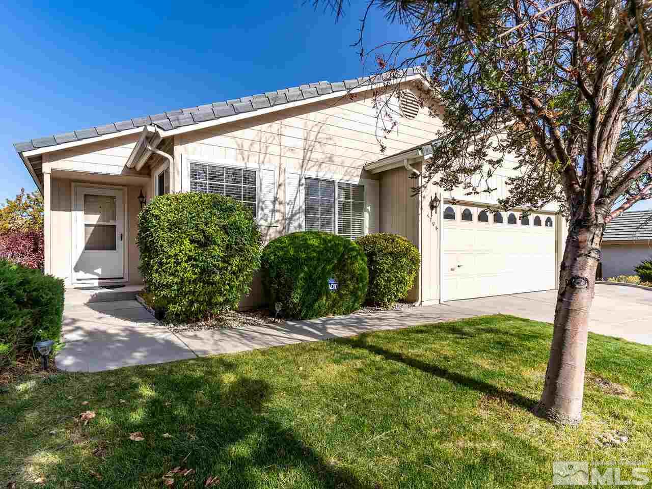 4765 Goodwin Road Sparks, NV 89436 - Photo 1 of 22 a view of a house with a yard