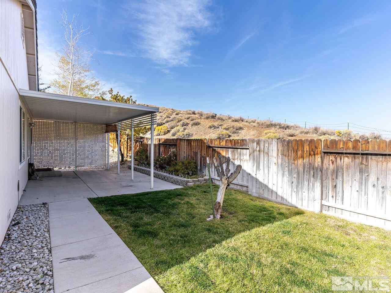 4765 Goodwin Road Sparks, NV 89436 - Photo 21 of 22 a view of a backyard