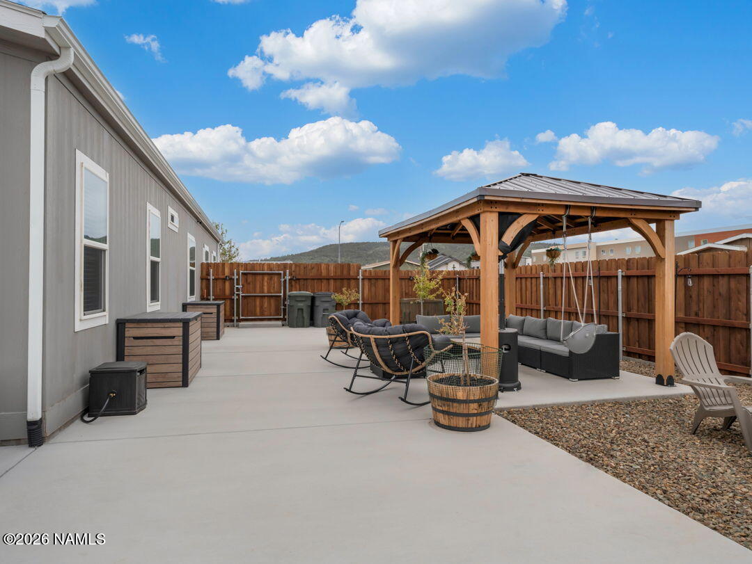 147 Pinecrest Trail Williams, AZ 86046 - Photo 27 of 39 a view of a house with backyard and sitting area