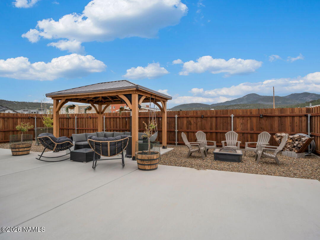 147 Pinecrest Trail Williams, AZ 86046 - Photo 28 of 39 a view of a terrace with lawn chairs