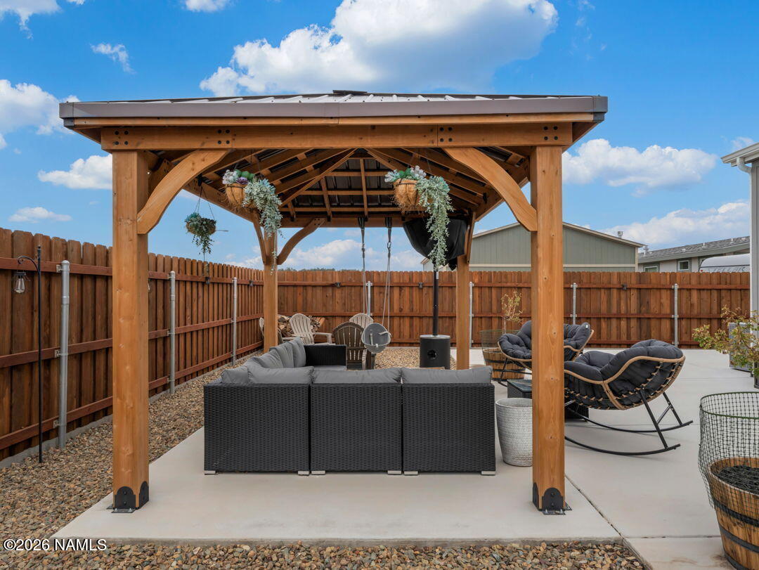 147 Pinecrest Trail Williams, AZ 86046 - Photo 31 of 39 a view of a roof deck with couches and potted plants