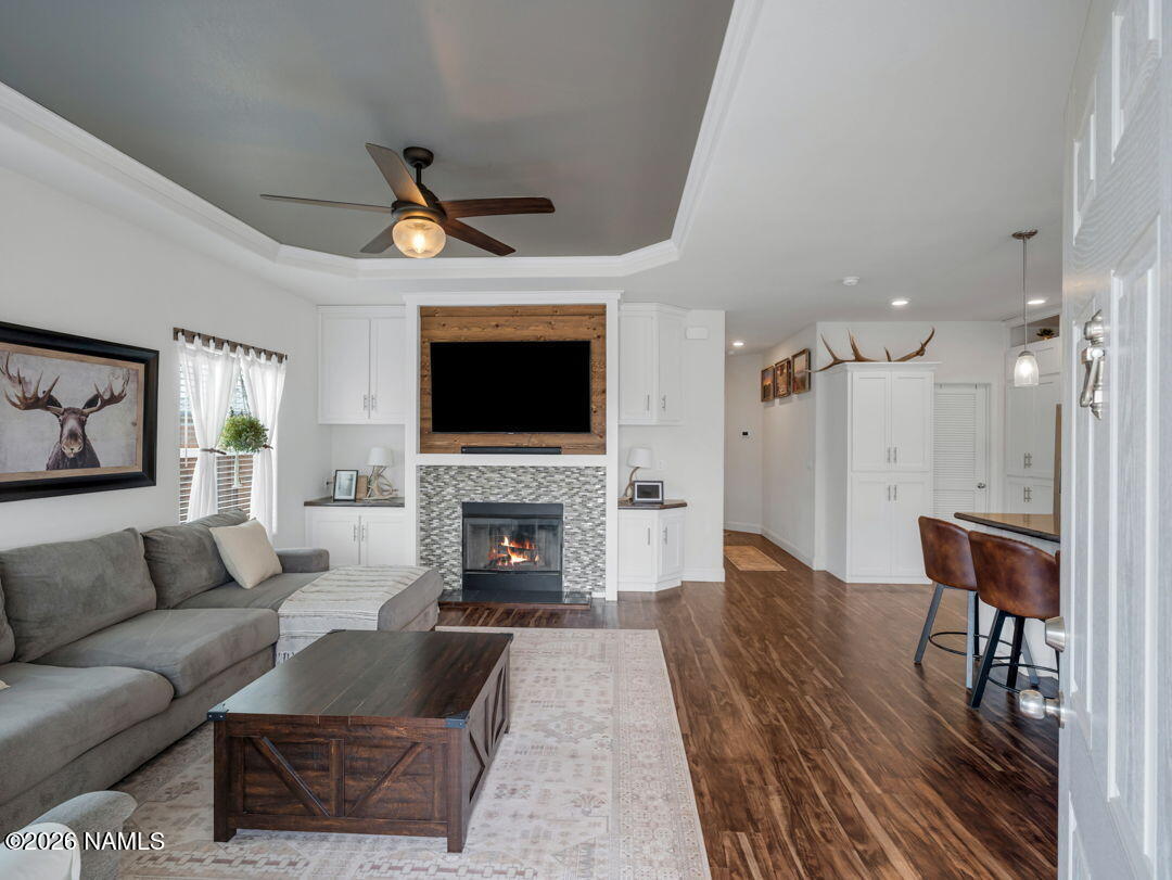 147 Pinecrest Trail Williams, AZ 86046 - Photo 8 of 39 a living room with furniture and a fireplace
