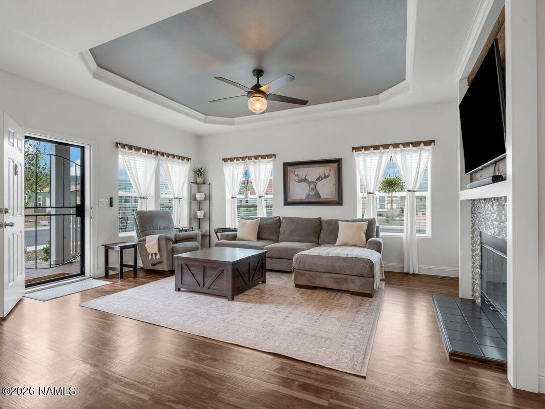 147 Pinecrest Trail Williams, AZ 86046 - Photo 9 of 39 a living room with fireplace furniture and a flat screen tv
