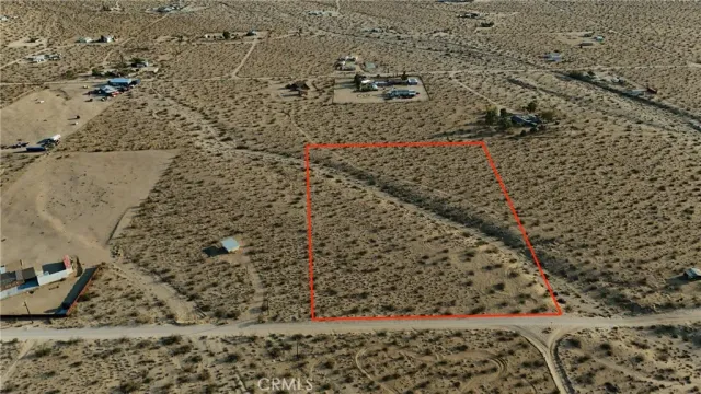 a view of mountains and valleys