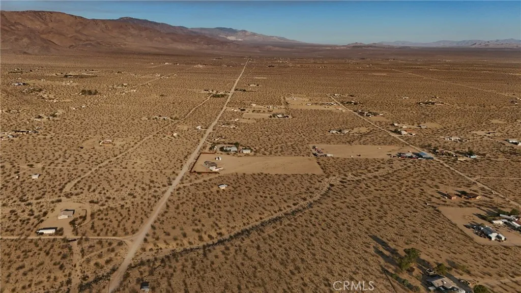 766 Quail Bush Road Johnson Valley, CA 92285 - Photo 8 of 9 a view of an ocean beach and mountain