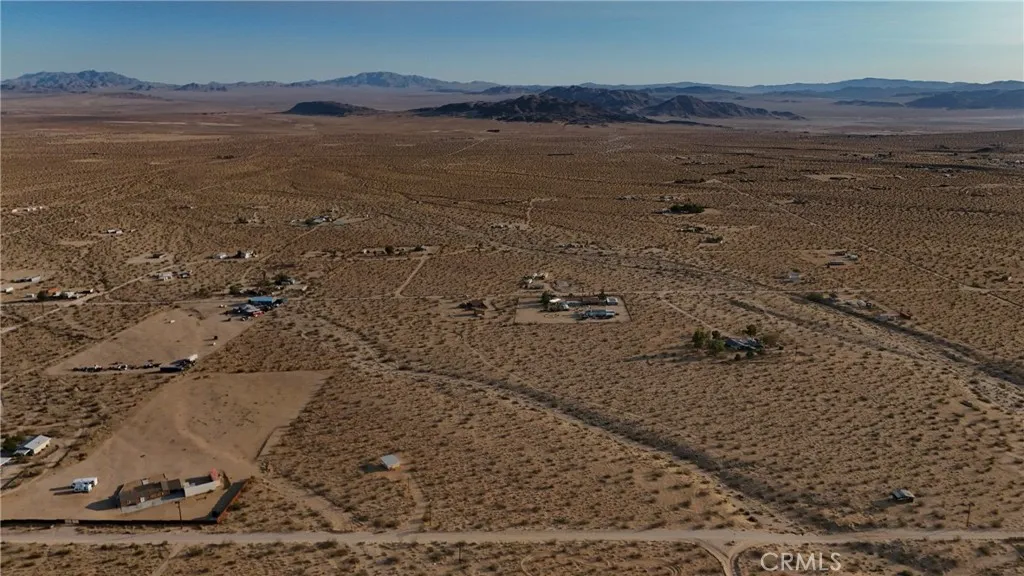 766 Quail Bush Road Johnson Valley, CA 92285 - Photo 9 of 9 a view of a lake in middle of forest
