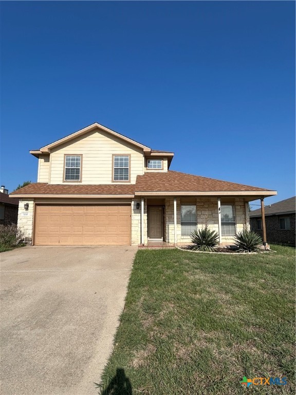 3043 Rain Dance Loop Harker Heights, TX 76548 - Photo 1 of 20 a front view of a house with a yard