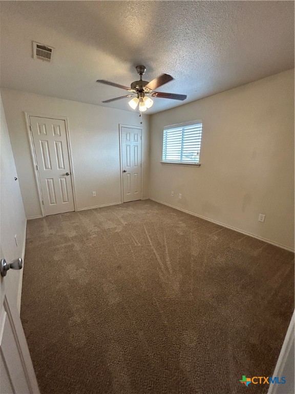 3043 Rain Dance Loop Harker Heights, TX 76548 - Photo 17 of 20 an empty room with windows and fan