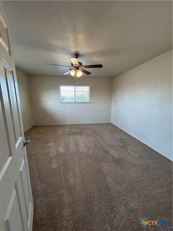 3043 Rain Dance Loop Harker Heights, TX 76548 - Photo 18 of 20 an empty room with a empty space and a ceiling fan