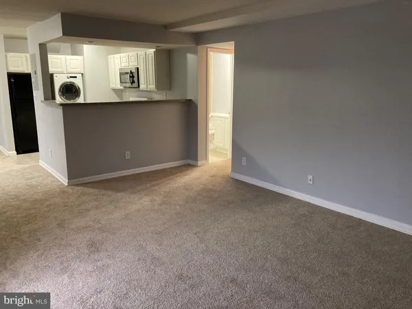 an empty room with window