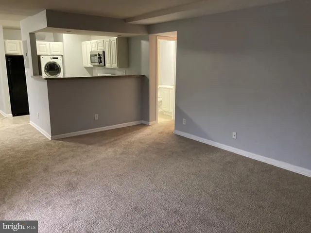 an empty room with window