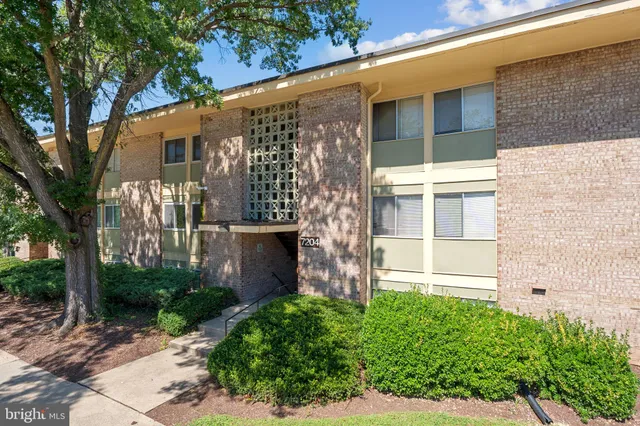 a brick building with a large windows