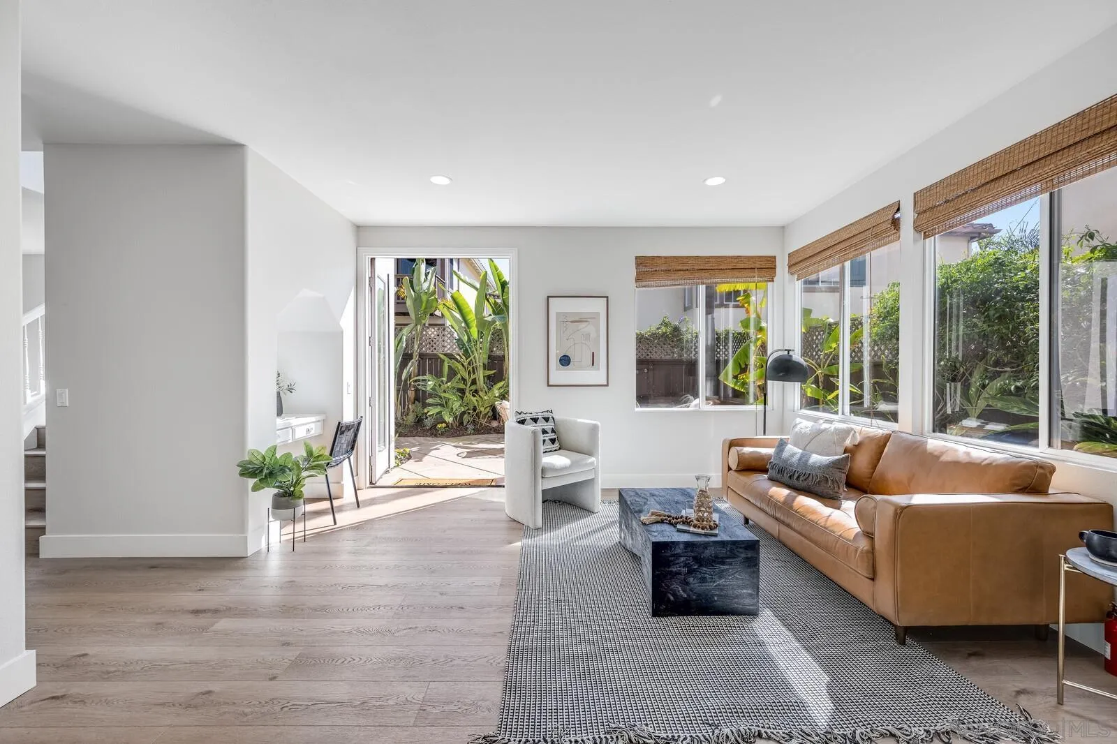 535 Anchorage Avenue Carlsbad, CA 92011 - Photo 17 of 36 a living room with furniture and large windows