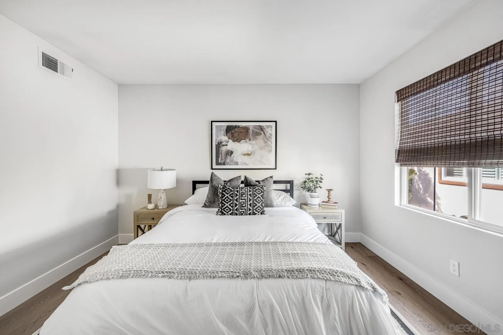 535 Anchorage Avenue Carlsbad, CA 92011 - Photo 28 of 36 a bedroom with a large bed and a window