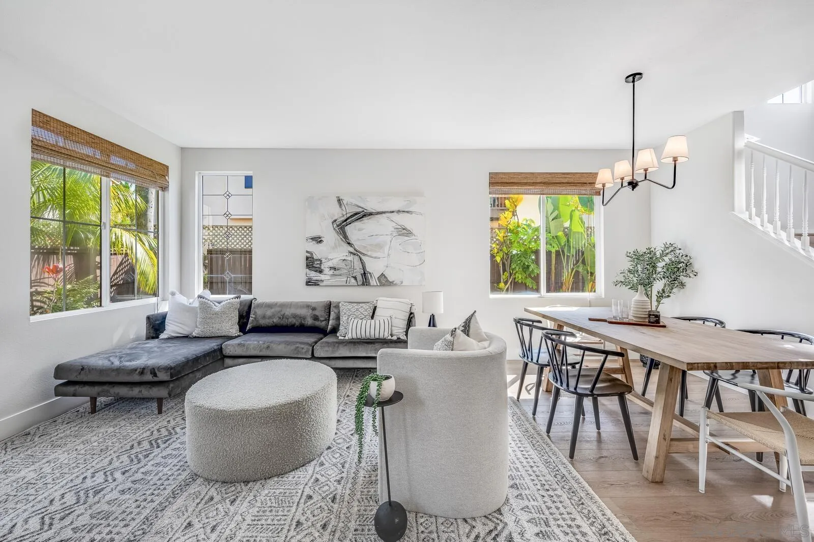 535 Anchorage Avenue Carlsbad, CA 92011 - Photo 5 of 36 a living room with furniture a table and a large window