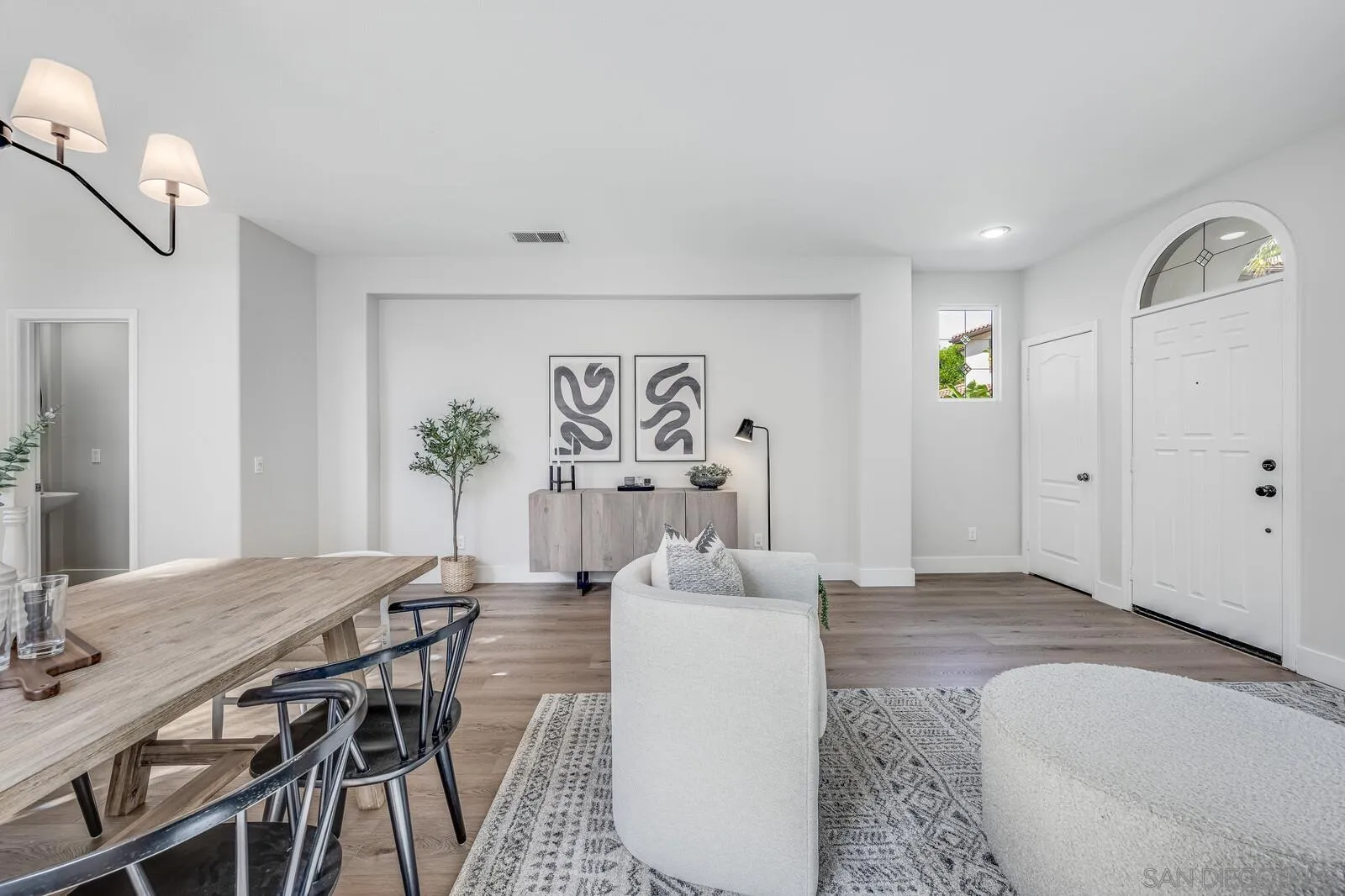 535 Anchorage Avenue Carlsbad, CA 92011 - Photo 6 of 36 a living room with furniture and wooden floor