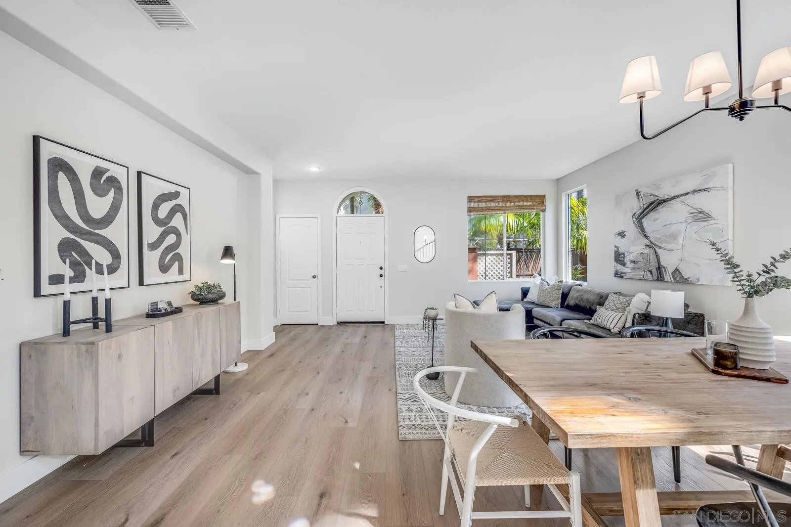 535 Anchorage Avenue Carlsbad, CA 92011 - Photo 8 of 36 a living room with furniture and wooden floor