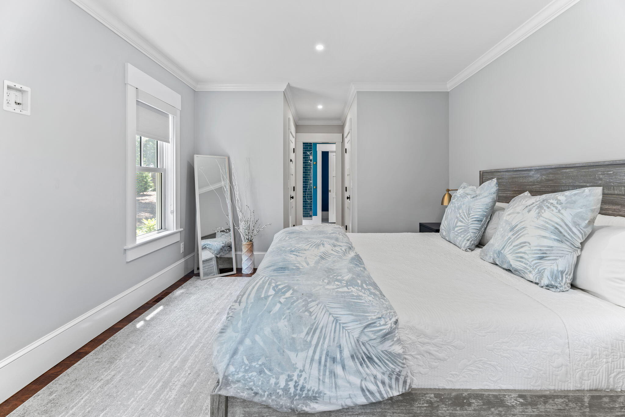 101 Warren Street Osterville, MA 02655 - Photo 11 of 39 a bed sitting in a bedroom next to a window