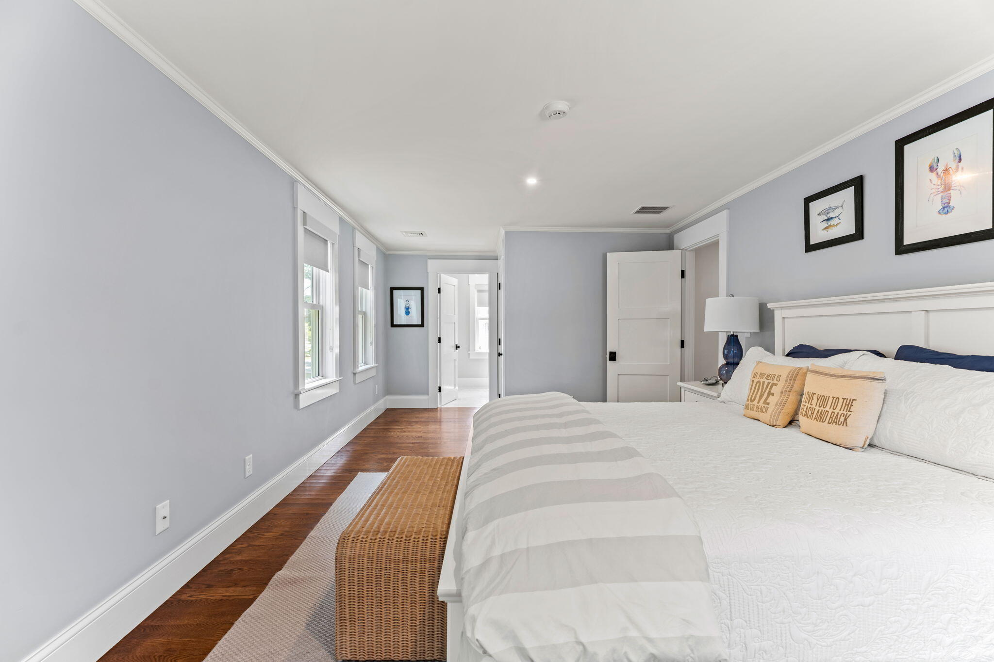101 Warren Street Osterville, MA 02655 - Photo 19 of 39 a spacious bedroom with a large bed and a window
