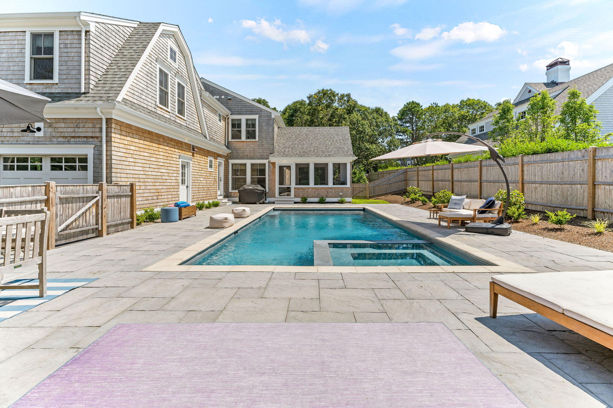 101 Warren Street Osterville, MA 02655 - Photo 23 of 39 a view of a house with swimming pool and sitting area