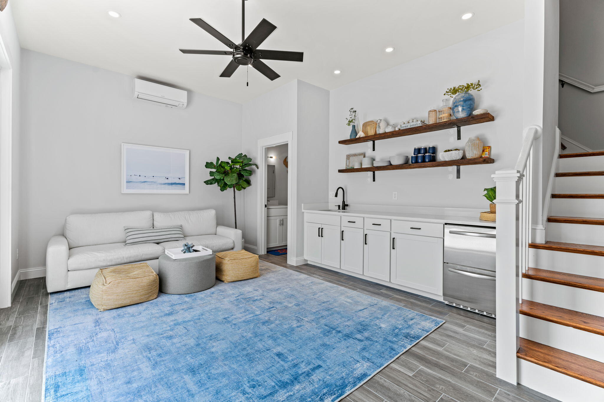 101 Warren Street Osterville, MA 02655 - Photo 26 of 39 a living room with furniture and a rug