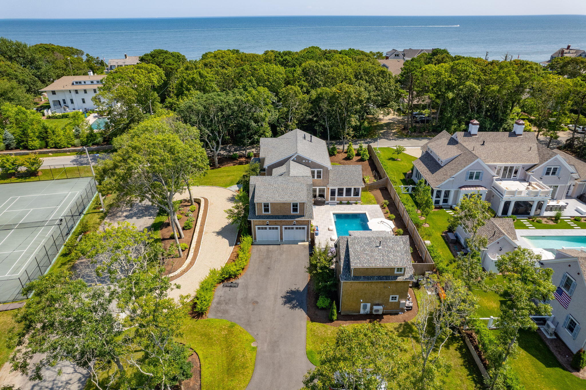 101 Warren Street Osterville, MA 02655 - Photo 29 of 39 an aerial view of a house with a yard swimming pool and outdoor seating