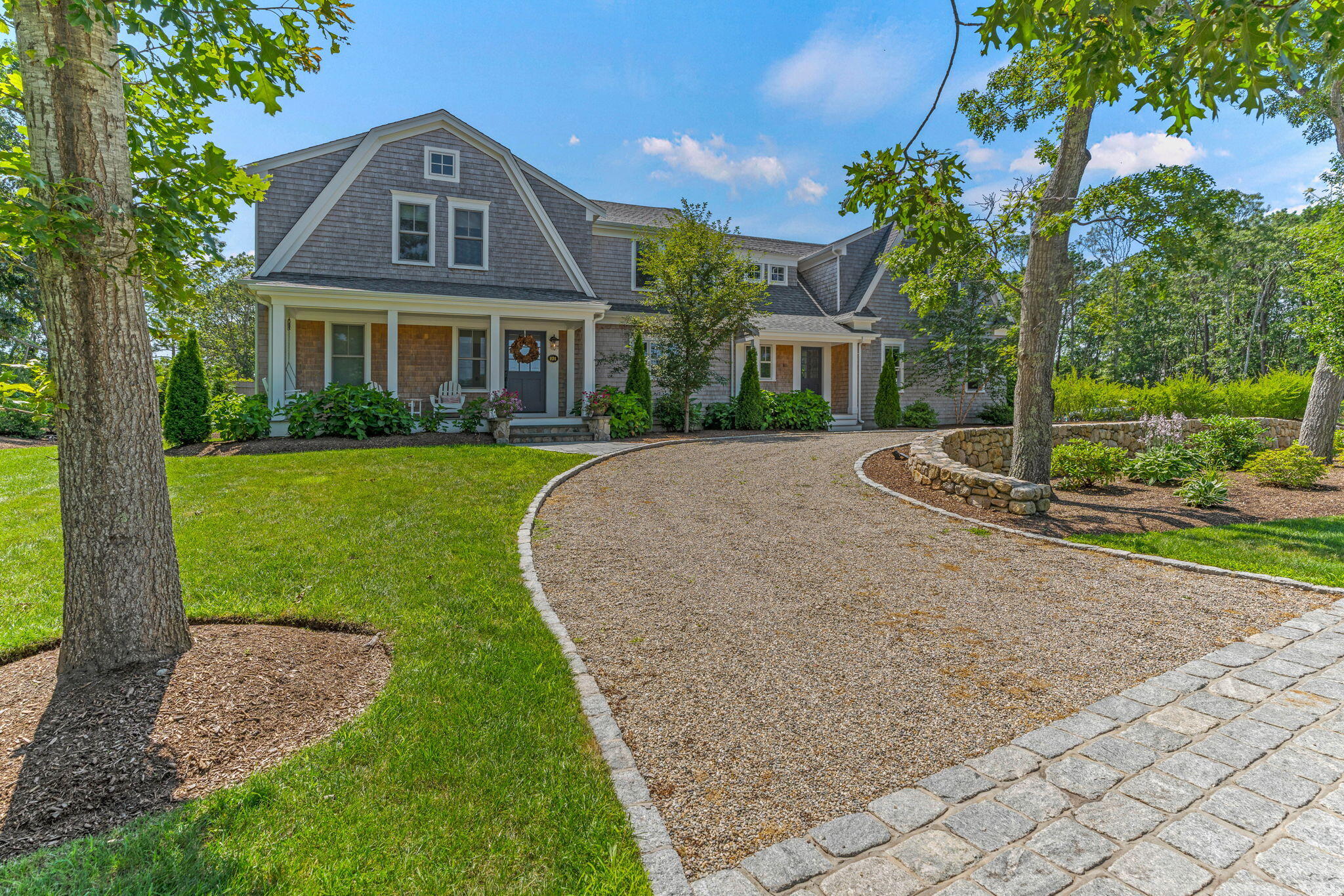 101 Warren Street Osterville, MA 02655 - Photo 36 of 39 a front view of a house with a yard
