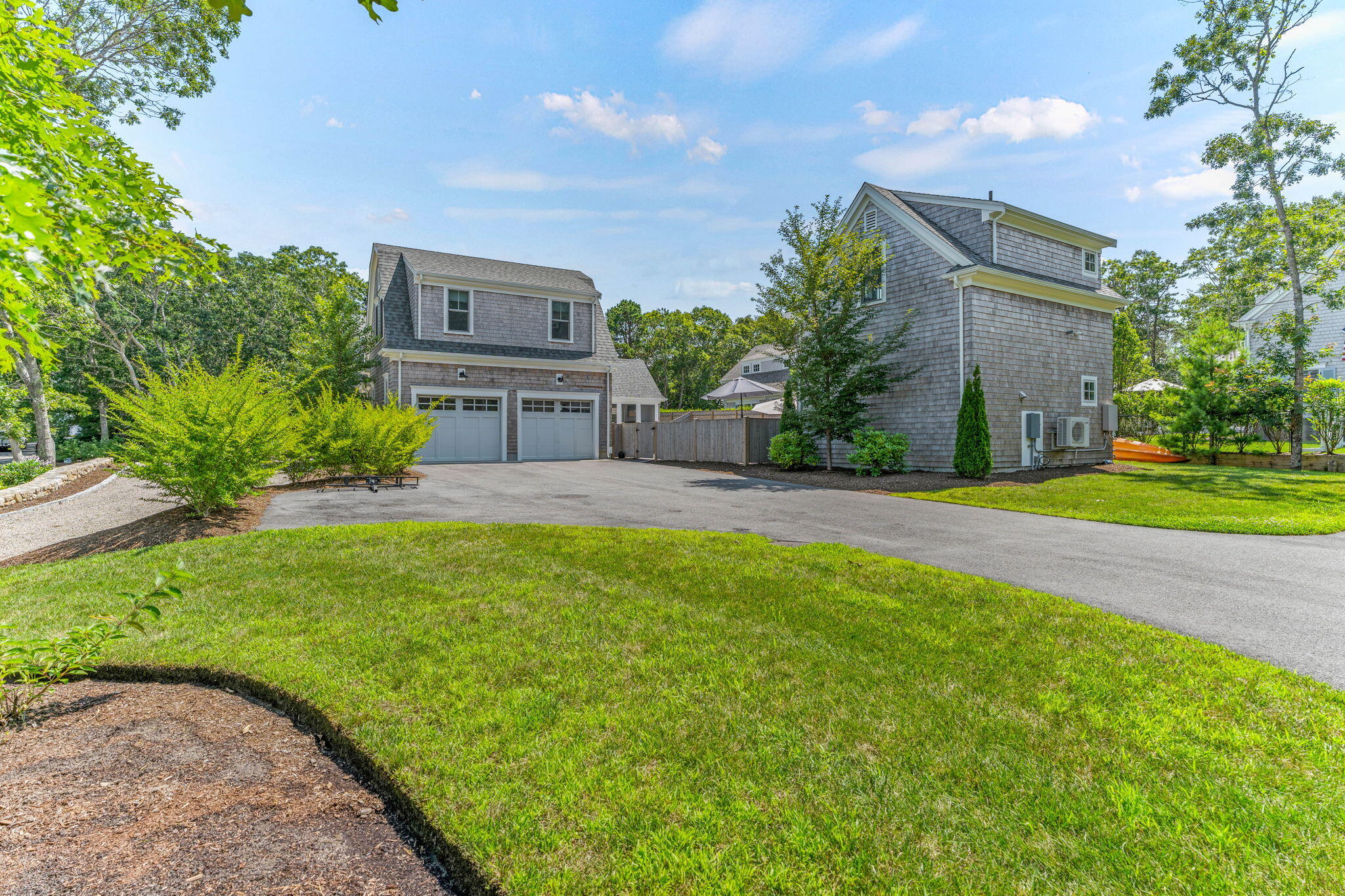101 Warren Street Osterville, MA 02655 - Photo 38 of 39 a view of an house with backyard and garden