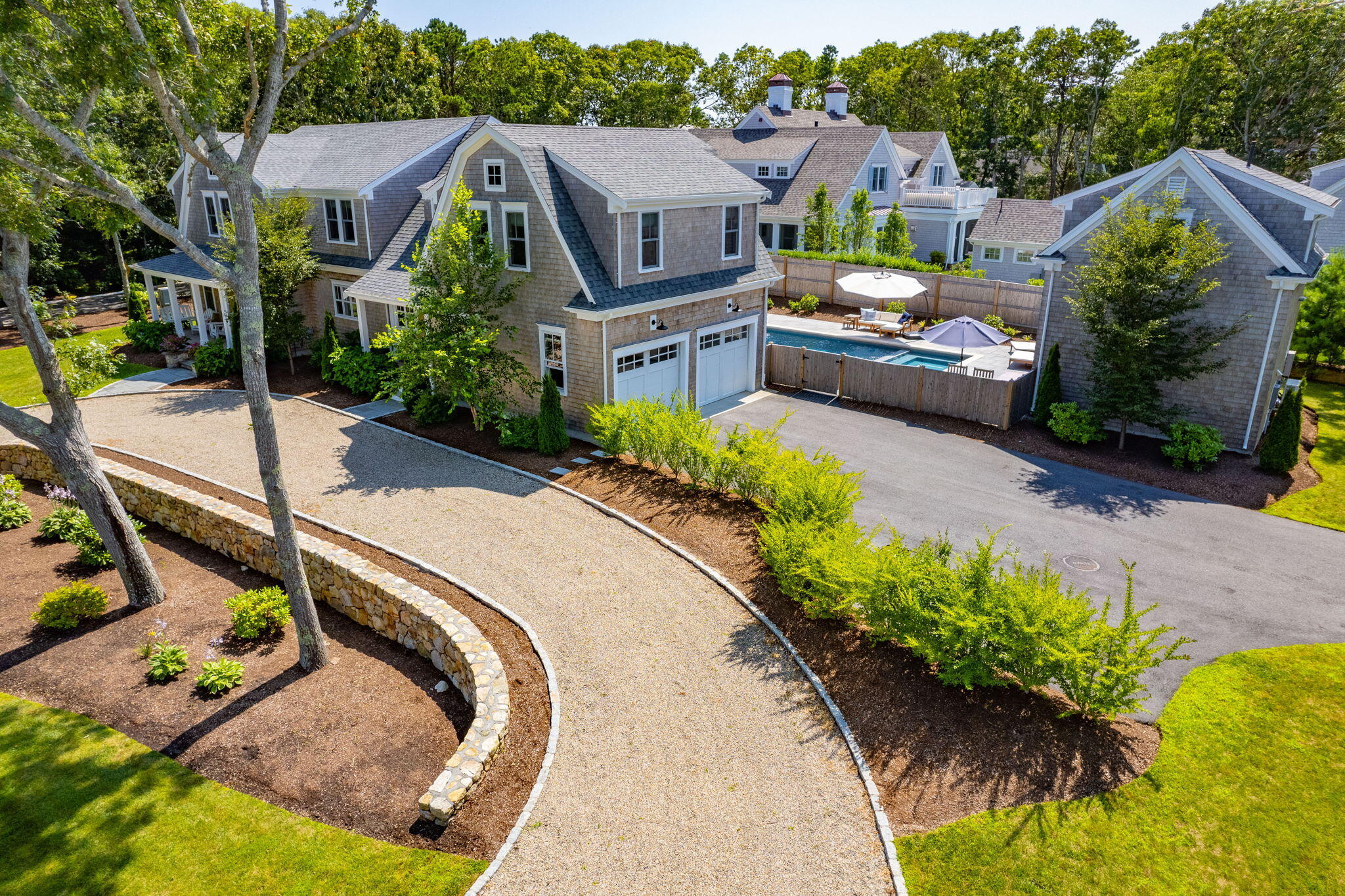 101 Warren Street Osterville, MA 02655 - Photo 39 of 39 an aerial view of a house with a garden and plants