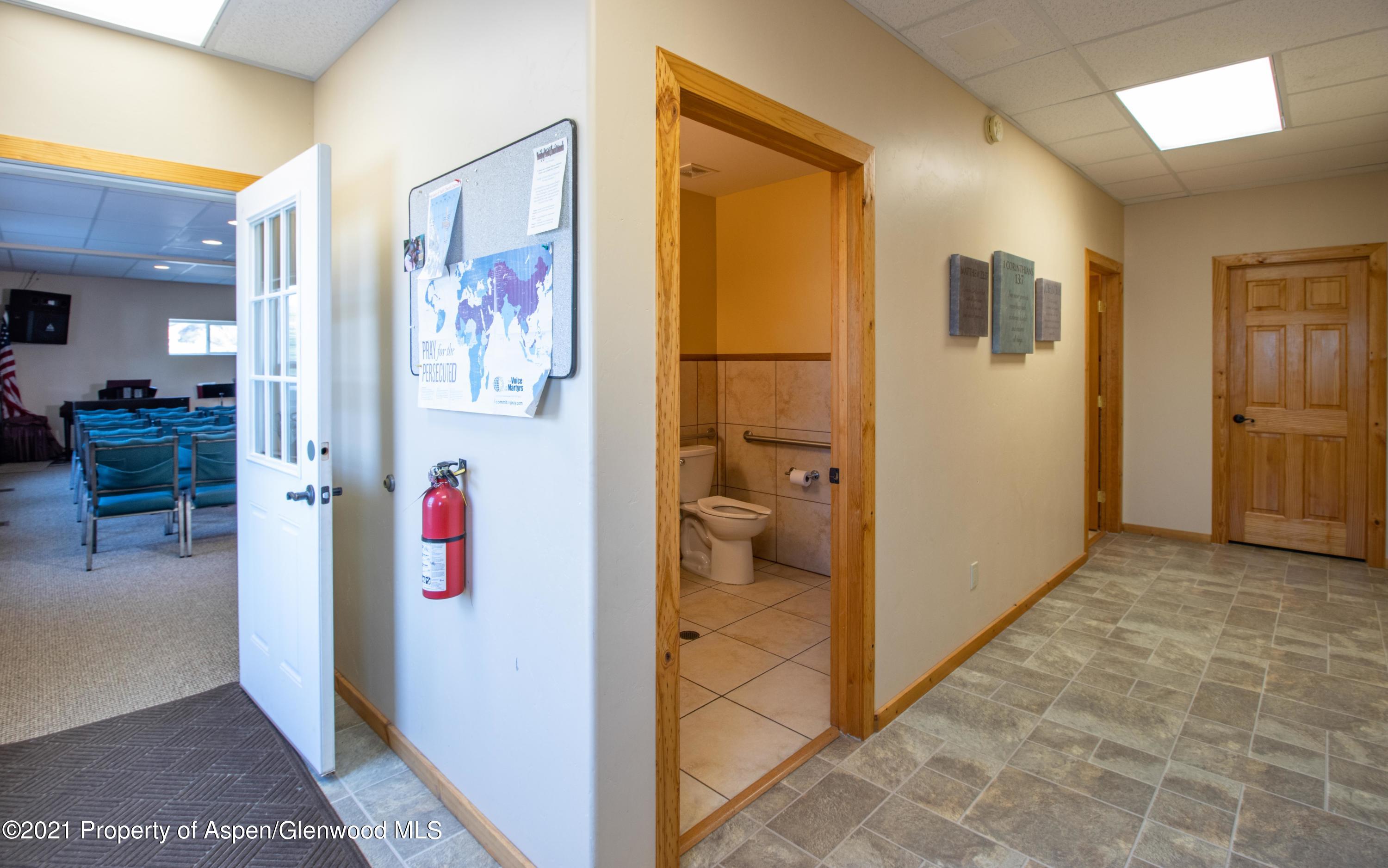 2730 Highway 13 Rifle, CO 81650 - Photo 6 of 30 a view of hallway with livingroom and furniture