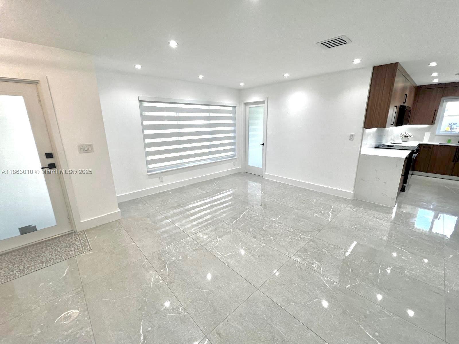 1590 Southwest 139th Avenue Davie, FL 33325 - Photo 5 of 20 a view of a kitchen with a sink and cabinets