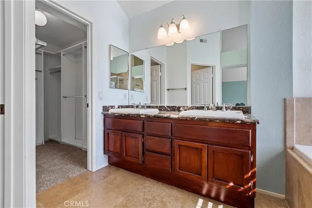 a view of an empty room with a fireplace