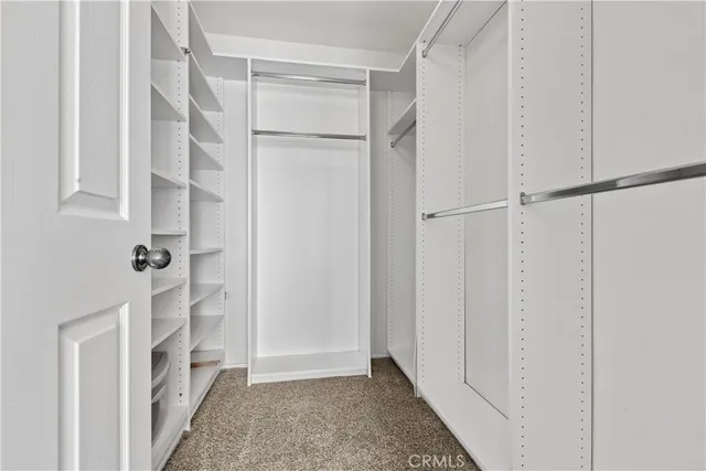 a view of a livingroom from a hallway