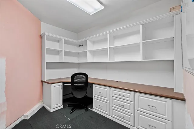 a utility room with cabinets
