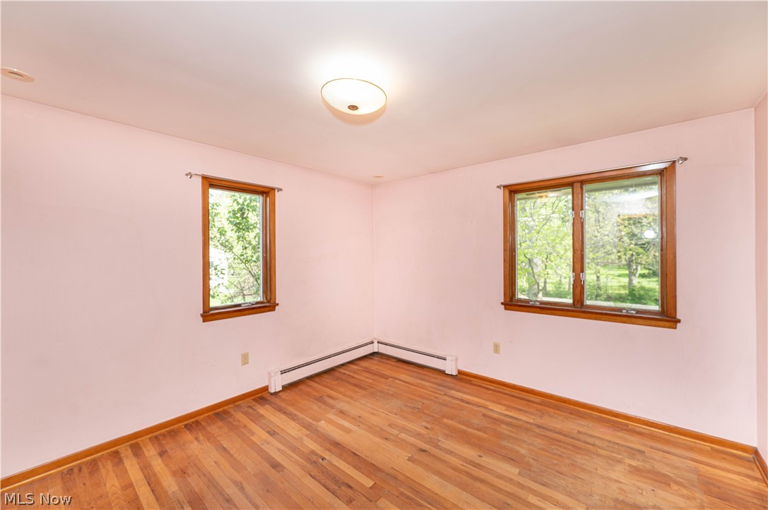 12310 Huntoon Road Painesville, OH 44077 - Photo 20 of 48 Generously sized bedroom #2 with hardwood floors