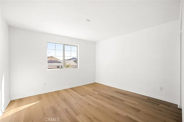 a bathroom with a tub sink and a mirror