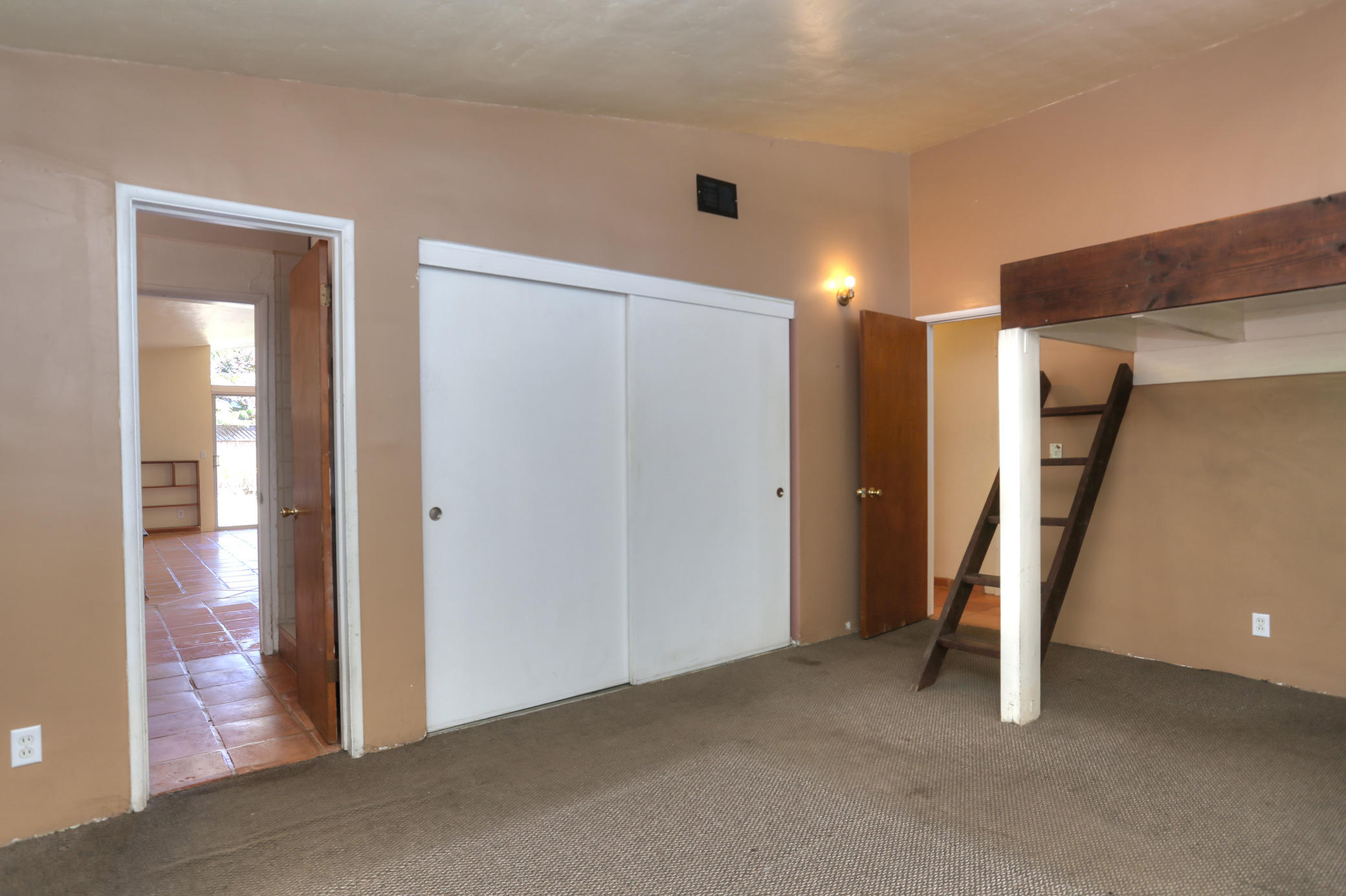 Master bedroom with built-in bed