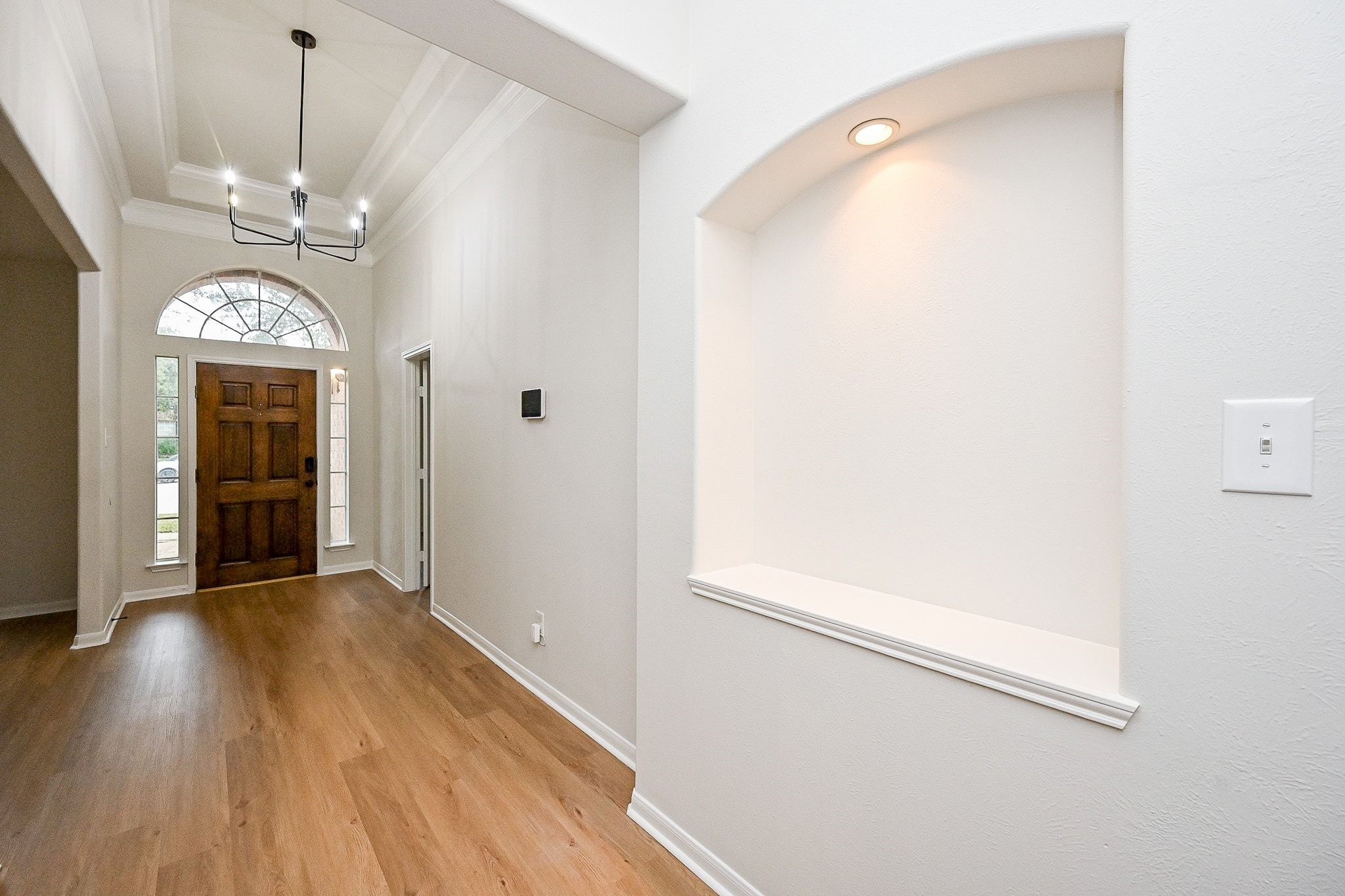 13007 Turnbridge Trail Houston, TX 77065 - Photo 11 of 20 a view of a hallway with wooden floor