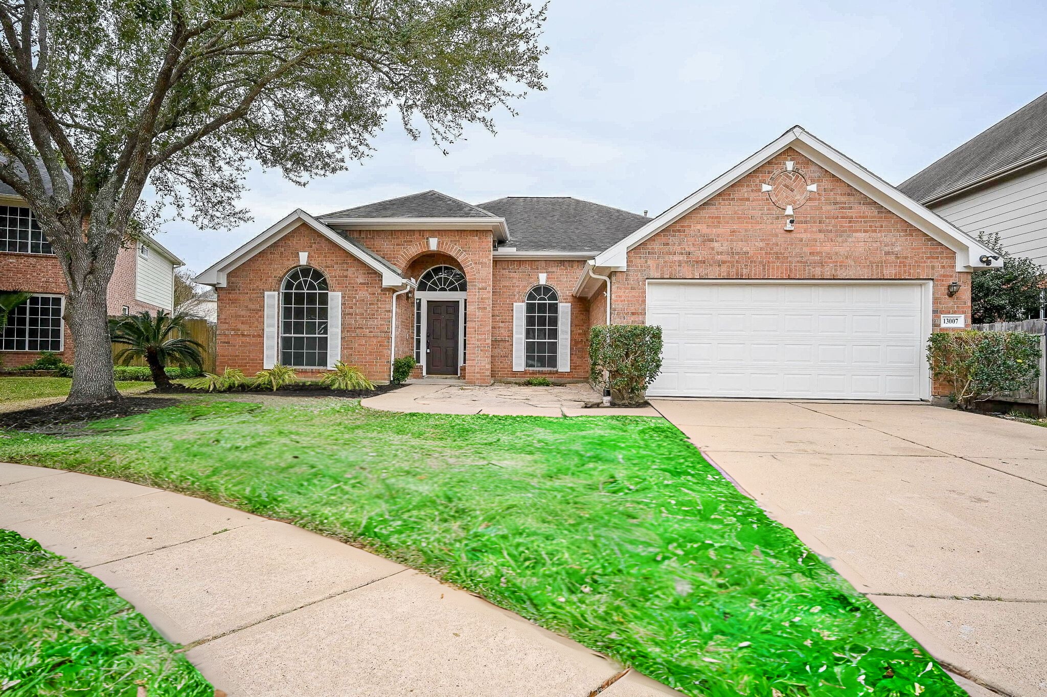 13007 Turnbridge Trail Houston, TX 77065 - Photo 2 of 20 a front view of house with yard and green space
