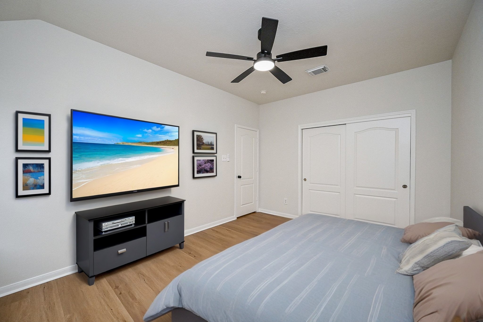 13007 Turnbridge Trail Houston, TX 77065 - Photo 7 of 20 a bedroom with a bed and a flat screen tv