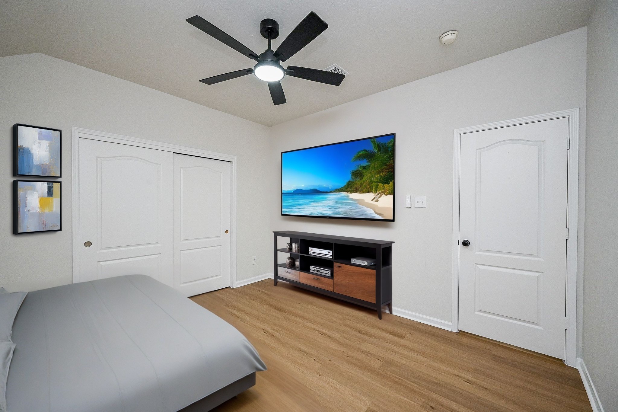13007 Turnbridge Trail Houston, TX 77065 - Photo 9 of 20 a bedroom with furniture a bed and a flat screen tv