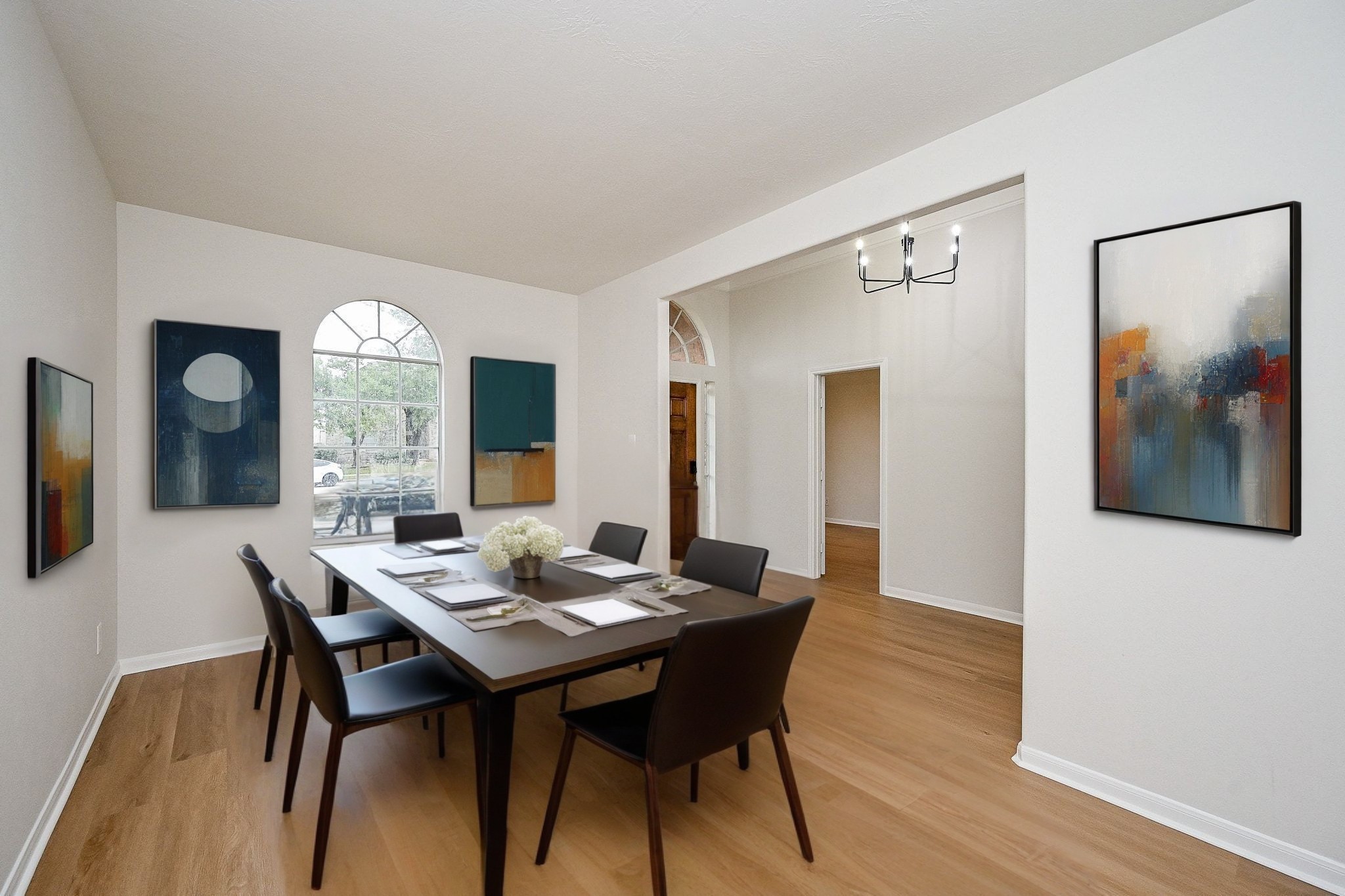 13007 Turnbridge Trail Houston, TX 77065 - Photo 10 of 20 a view of a dining room with furniture and wooden floor